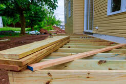 New wood deck being assembled